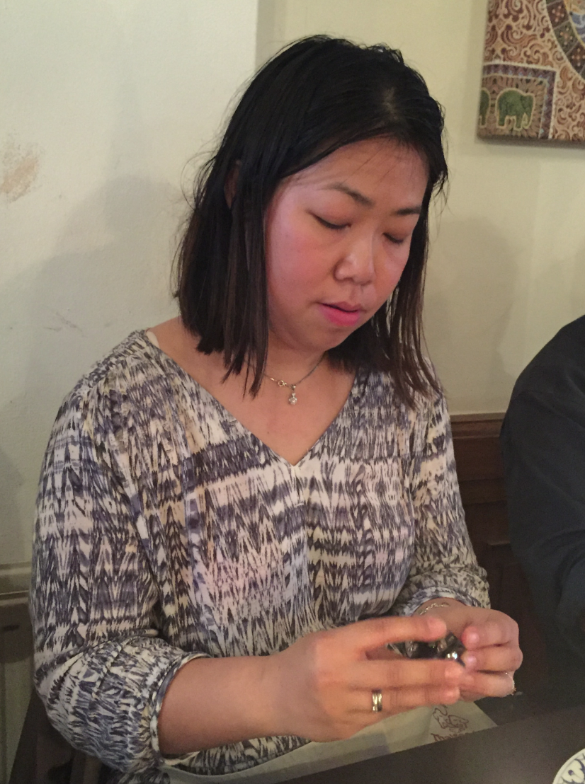 Sharon doing a very difficult puzzle..