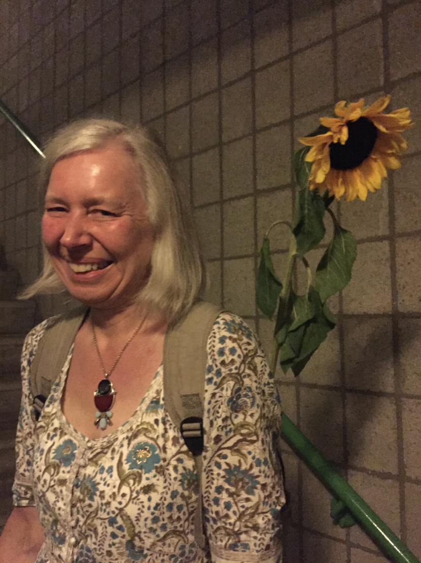 With a sunflower..